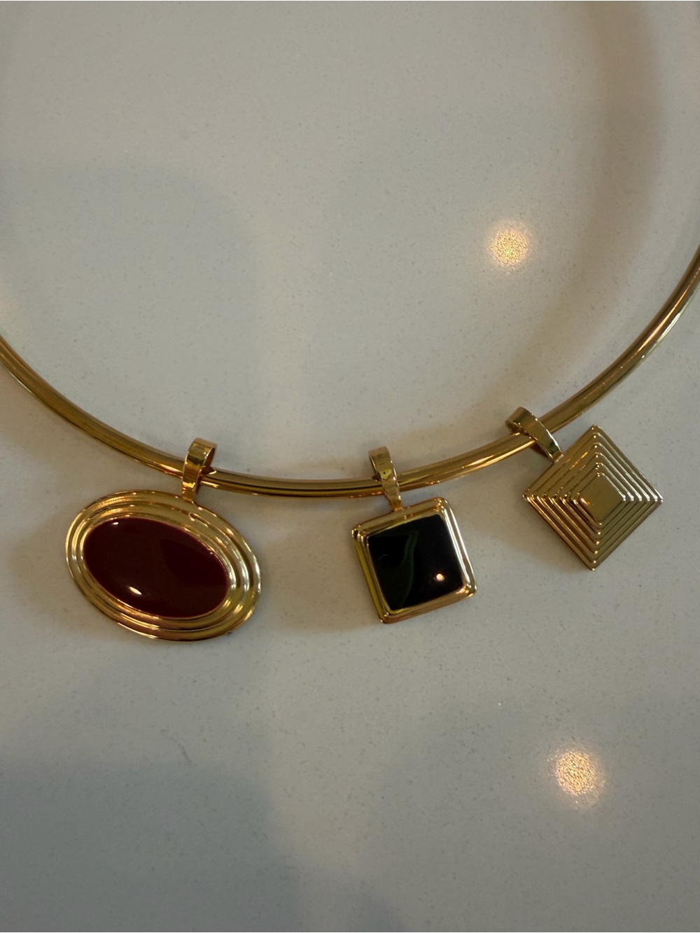 Gold Pendant Necklace with Red and Black Stone Charms